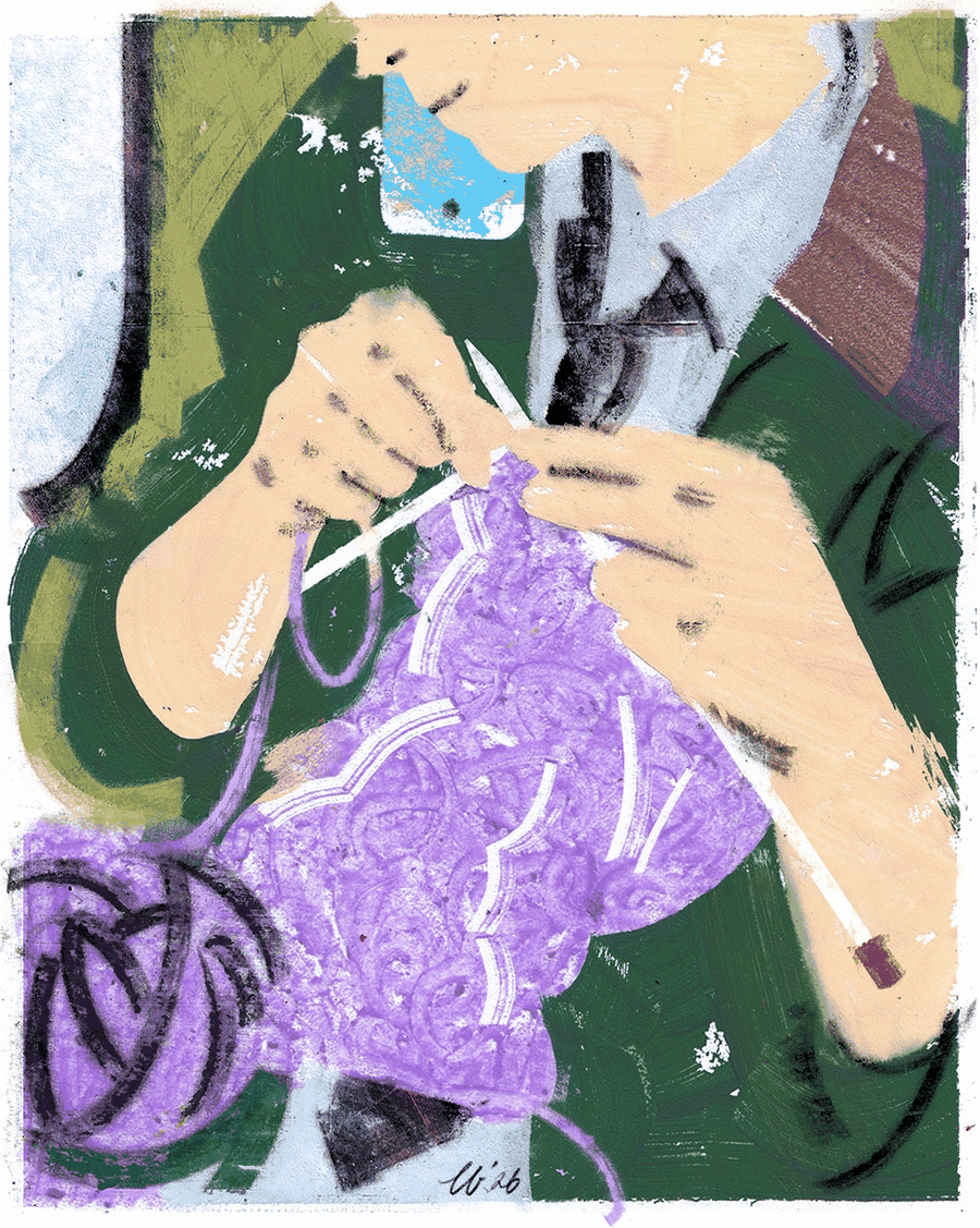 Young man knitting on a commuter train