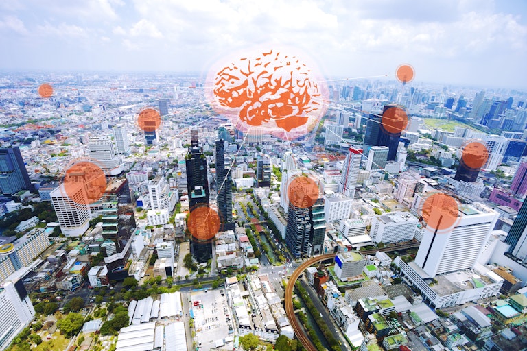 A brain hovering over a city grid, with connection lines extending to various landmarks